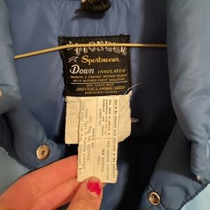 Down pioneer vest. Sized medium - just too tight for me. Bought used